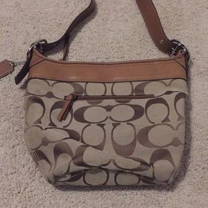 Coach tan canvas and a leather crossbody bag